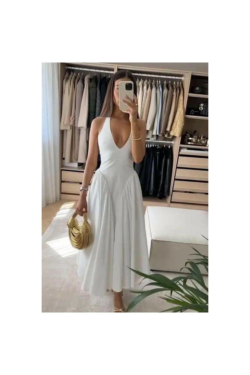 Evelyn Dress – Eleganz trifft Leichtigkeit.