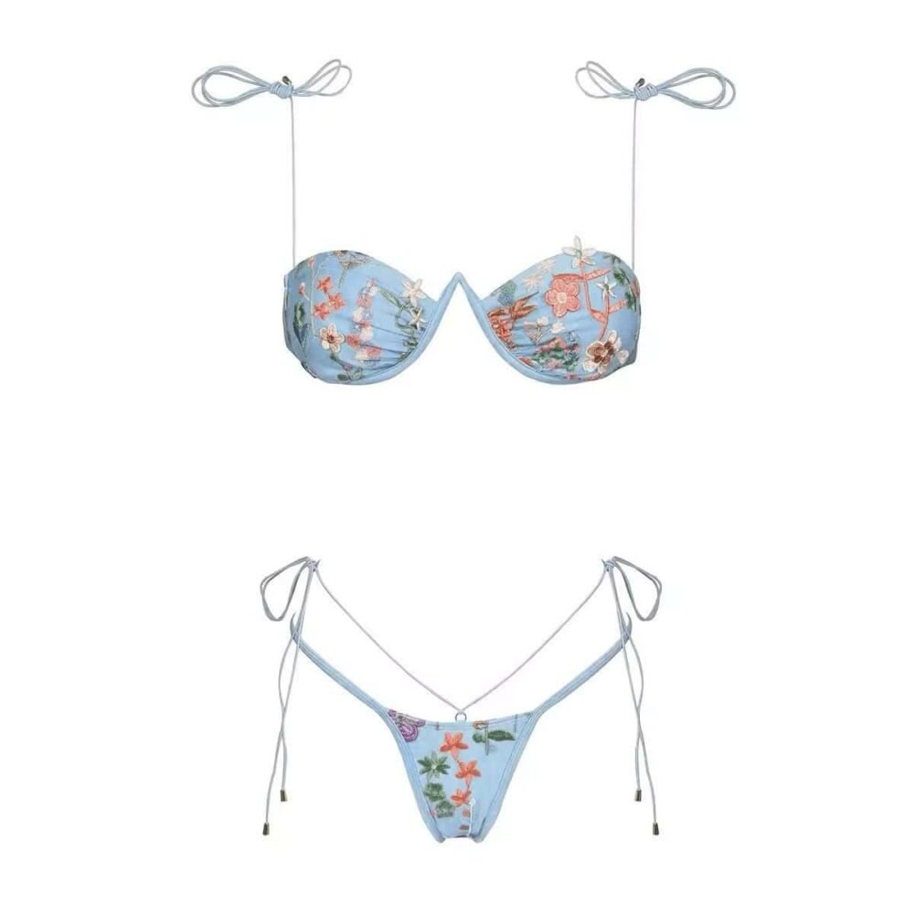 Light blue bikini with floral patterns and string ties.