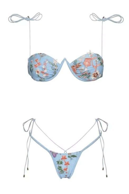 Light blue bikini with floral patterns and string ties.