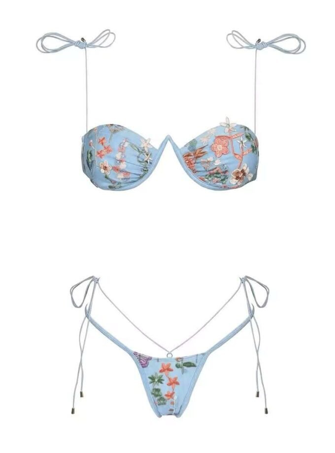 Light blue bikini with floral patterns and string ties.