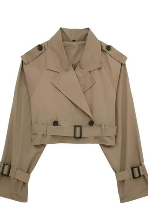 Cropped trench coat with broad lapel collar, shoulder epaulets, and belted waist, made from water-repellent cotton blend.