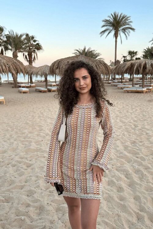 Elle Rose summer dress, breathable fabric, beach setting, feminine details.