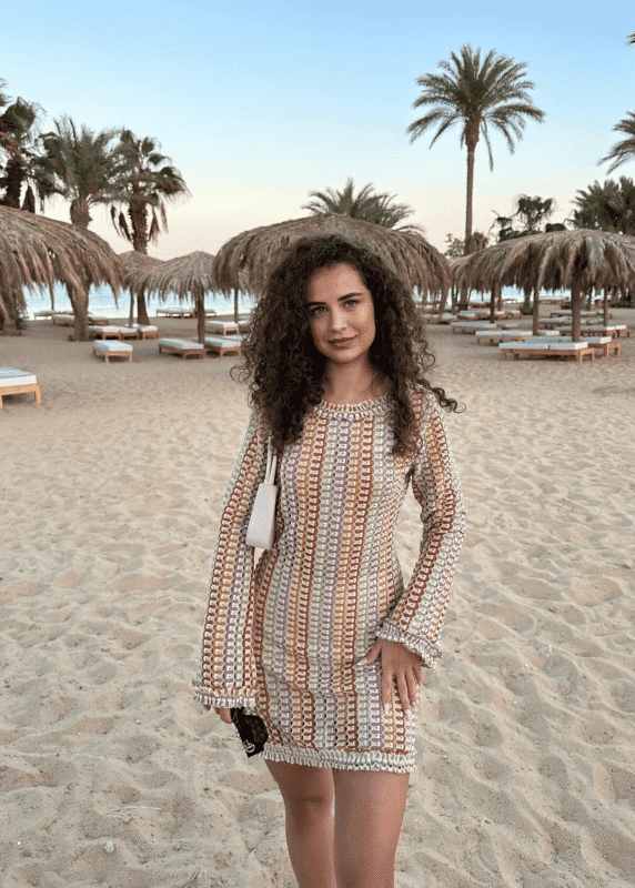 Elle Rose summer dress, breathable fabric, beach setting, feminine details.