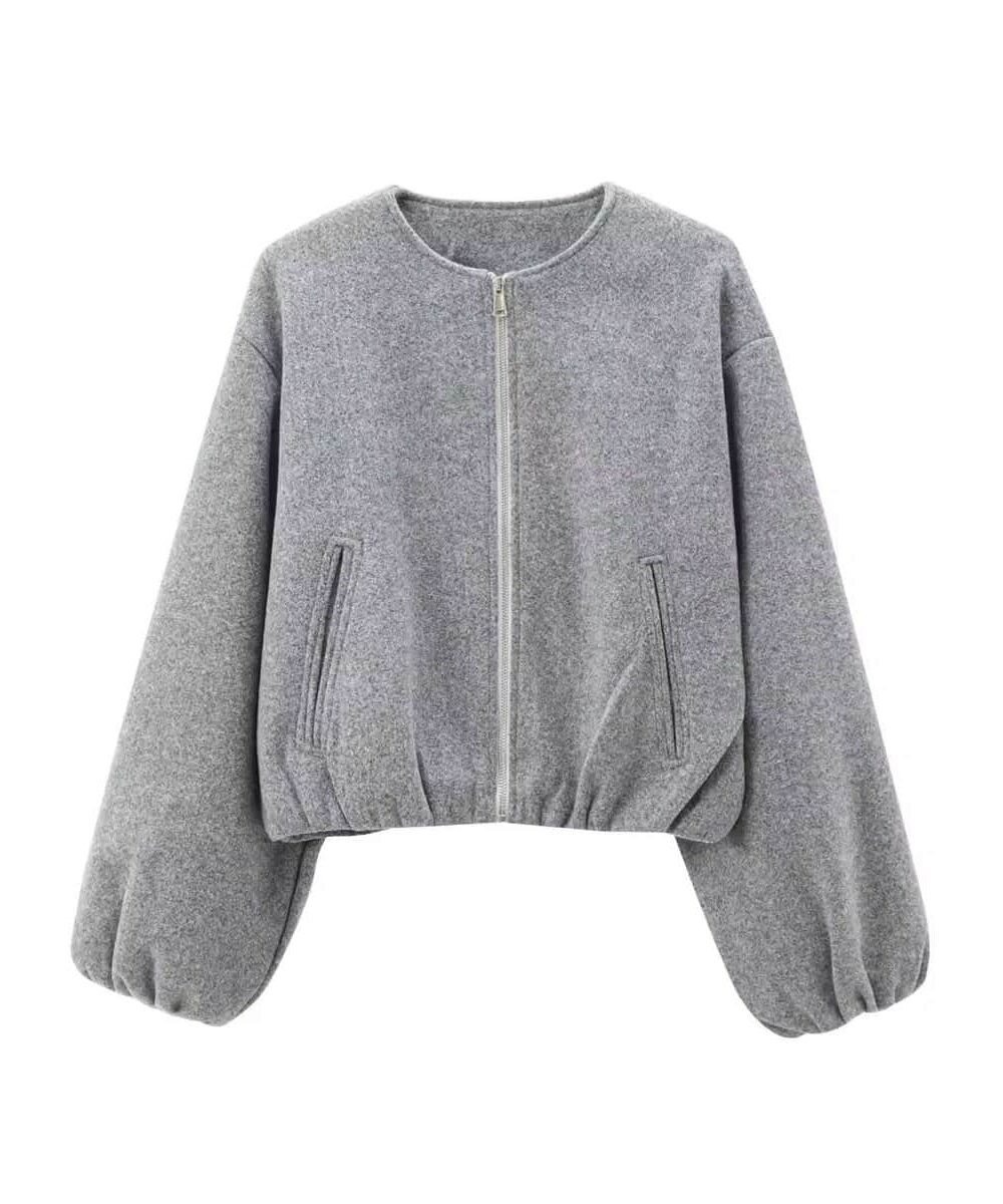 Gray essential balloon jacket with wide sleeves, zip pockets, elastic hem, and minimalist design.