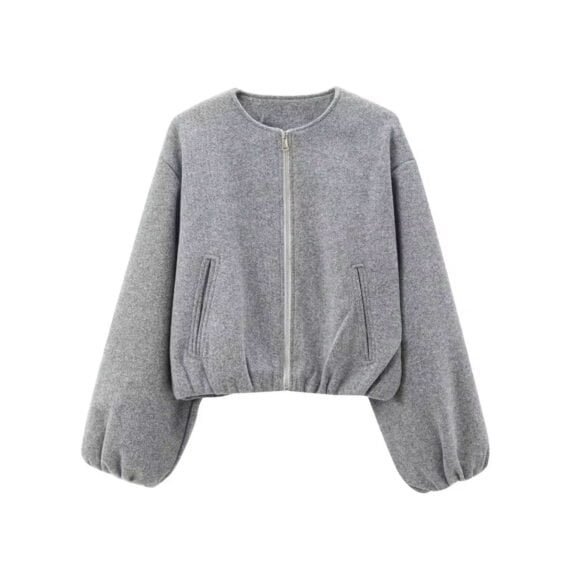 Gray essential balloon jacket with wide sleeves, zip pockets, elastic hem, and minimalist design.