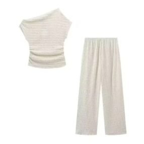 Luna Lounge Set with asymmetrical top and flowing pants in soft, stretchy fabric.
