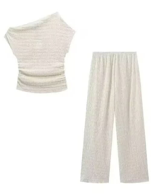 Luna Lounge Set with asymmetrical top and flowing pants in soft, stretchy fabric.