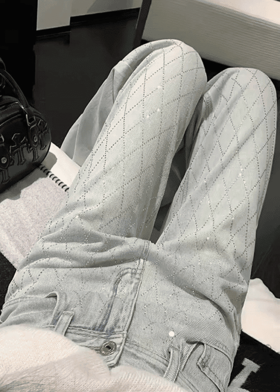 Stylish light blue denim with rhinestone accents and subtle diamond pattern, Luxe Crystal Denim.