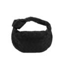 Mini woven bag in black vegan leather with grid details and silver hardware.