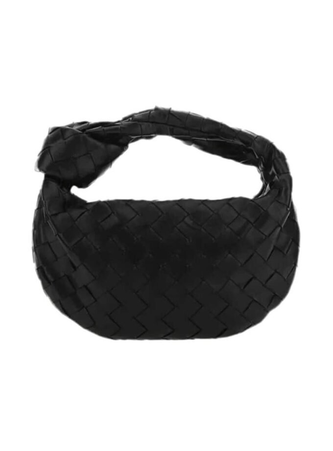 Mini woven bag in black vegan leather with grid details and silver hardware.