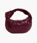 Mini woven bag made of Italian vegan leather with a grid pattern and silver hardware.