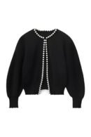 Luxurious black cardigan with pearl trim along collar and button placket.
