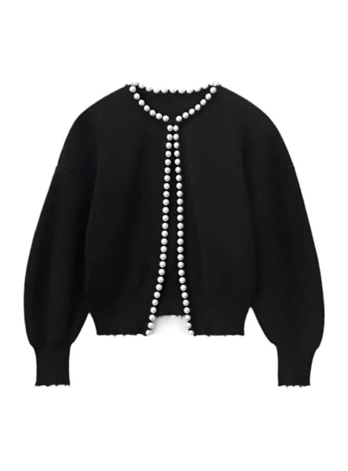 Luxurious black cardigan with pearl trim along collar and button placket.