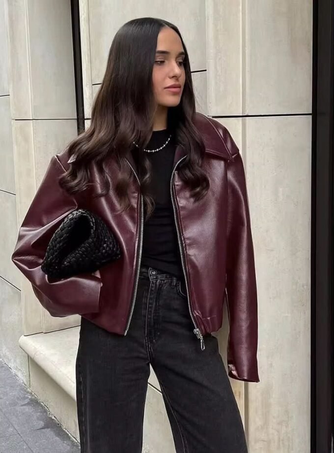 Elegant oversized burgundy leather jacket, premium faux leather, stylish finish.