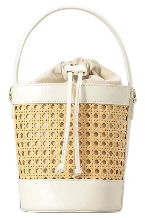 Cream and beige woven bucket bag with handle and drawstring closure.