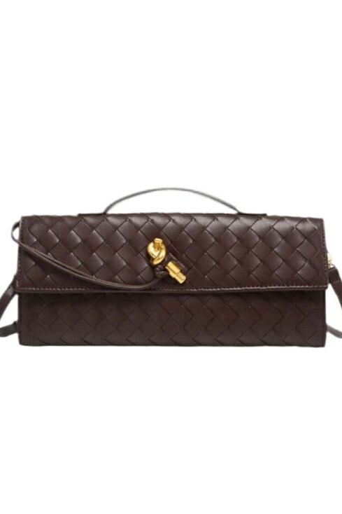 Luxurious burgundy shoulder bag "Royal Weave" with woven design and gold knot detail.