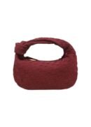 Suede braided hobo handbag with woven design and curved handle.